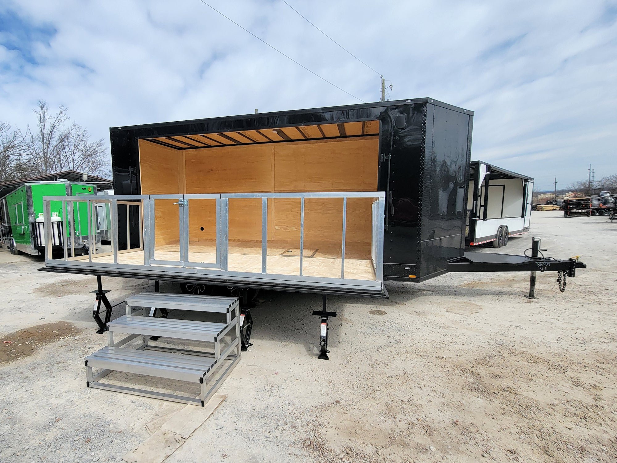 8.5' X 18' Custom Enclosed Hydraulic Stage and Event Deck Over Trailer