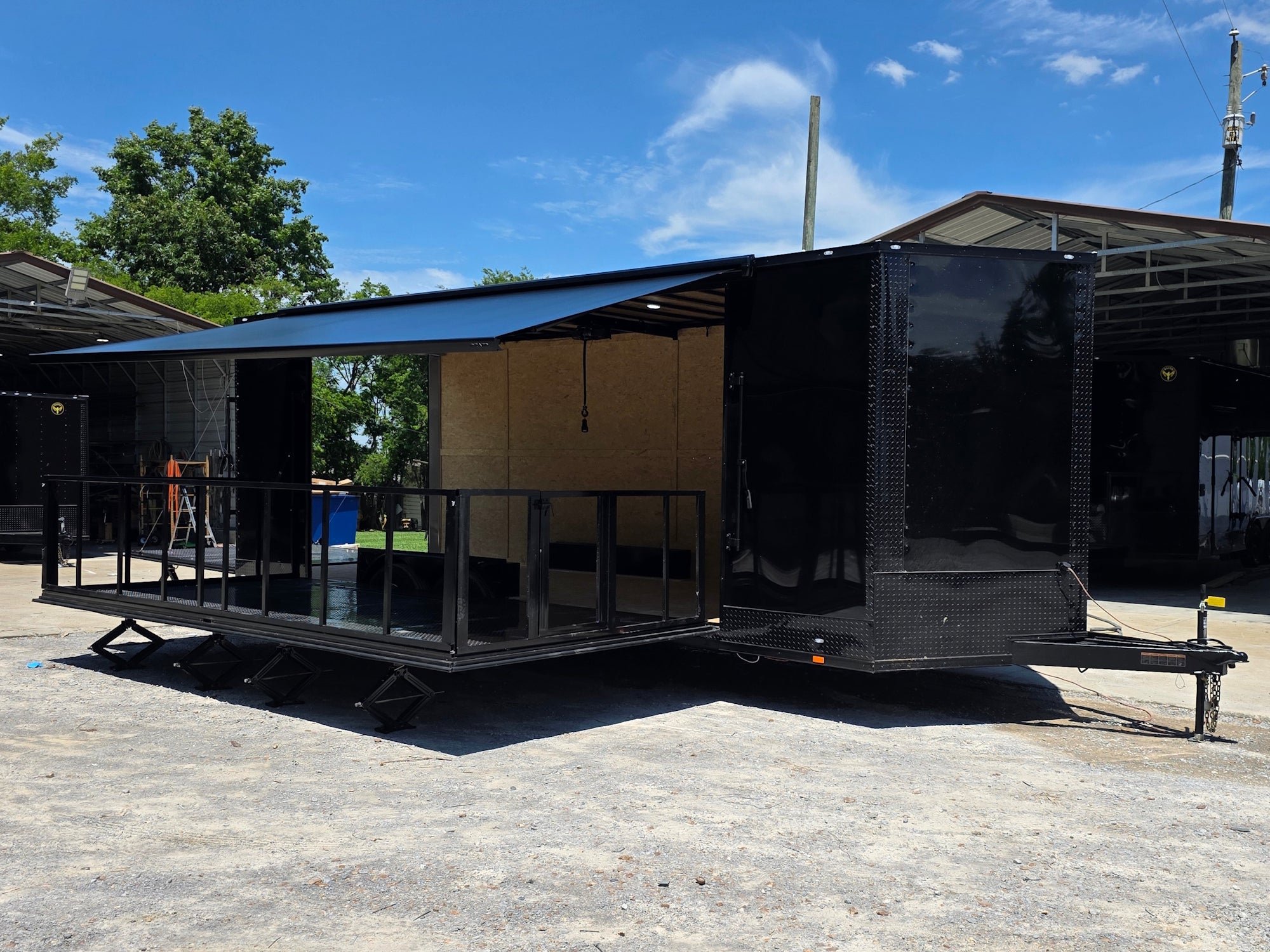 8.5' X 24' Black Custom Stage and Marketing Showcase Enclosed Trailer