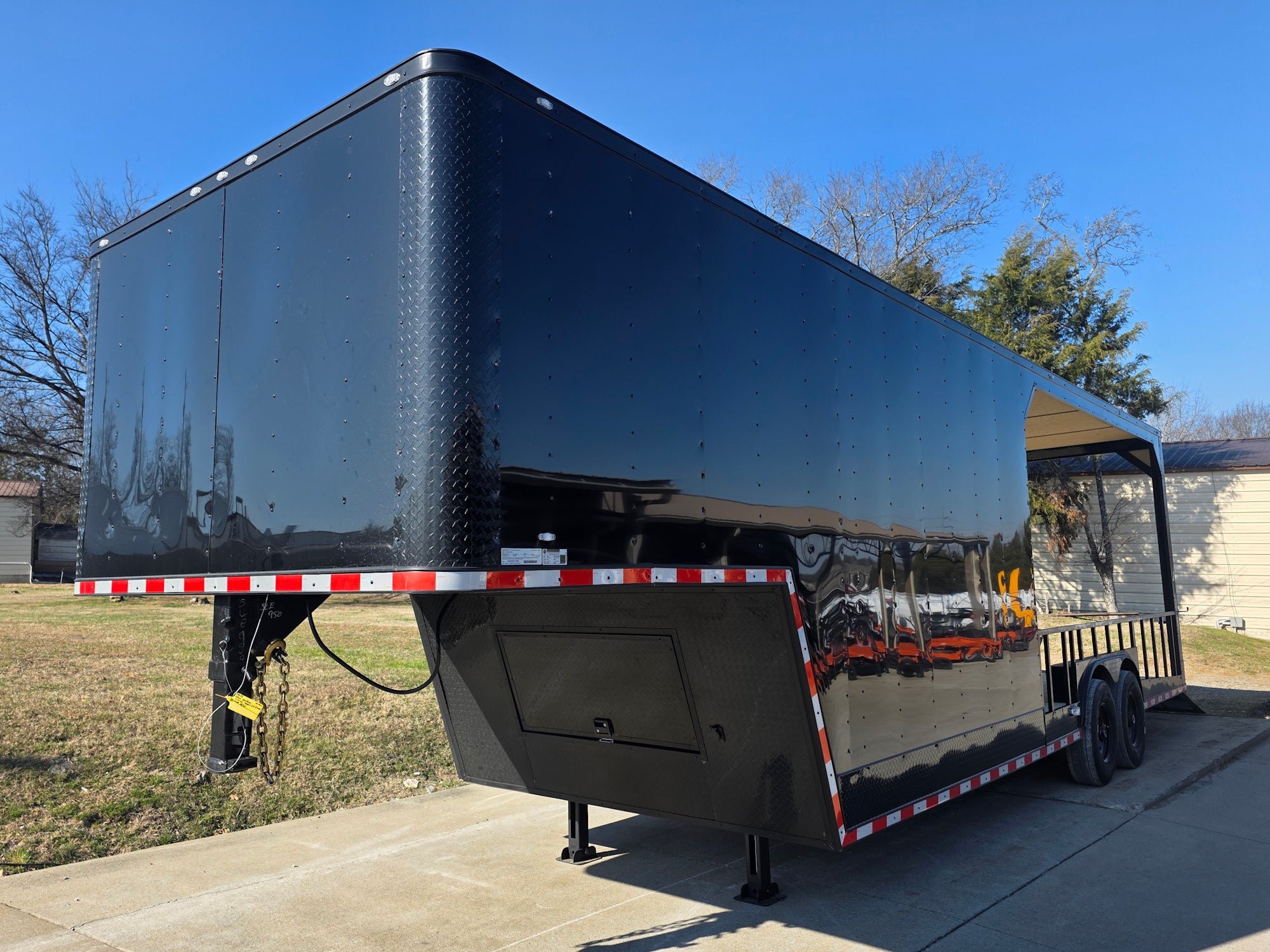 8.5' X 32' Gooseneck Hybrid Enclosed Trailer and 16' Porch With Fold Out Gate
